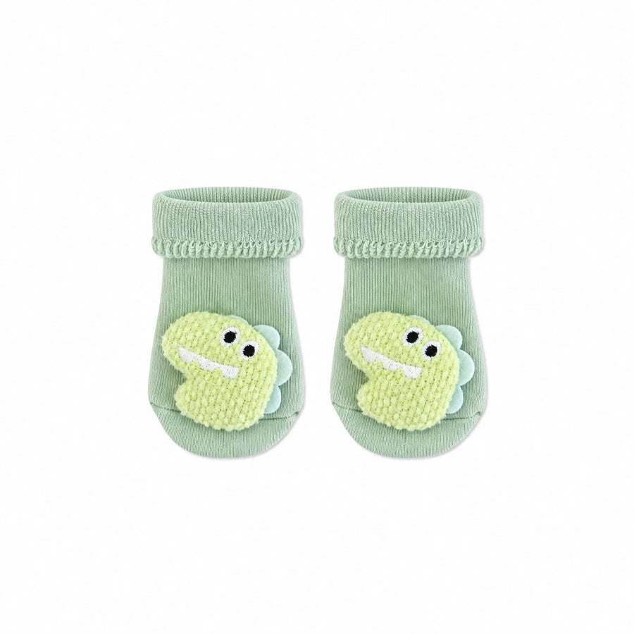 Baby Dino Socks in sage green with a 3D knitted dino face, Socks Up UAE
