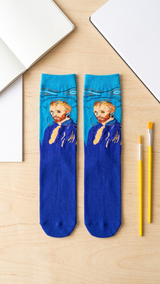 Pair of blue socks featuring Van Gogh self-portrait design with turquoise top.