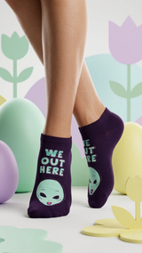 Dark purple ankle socks with mint green alien faces.