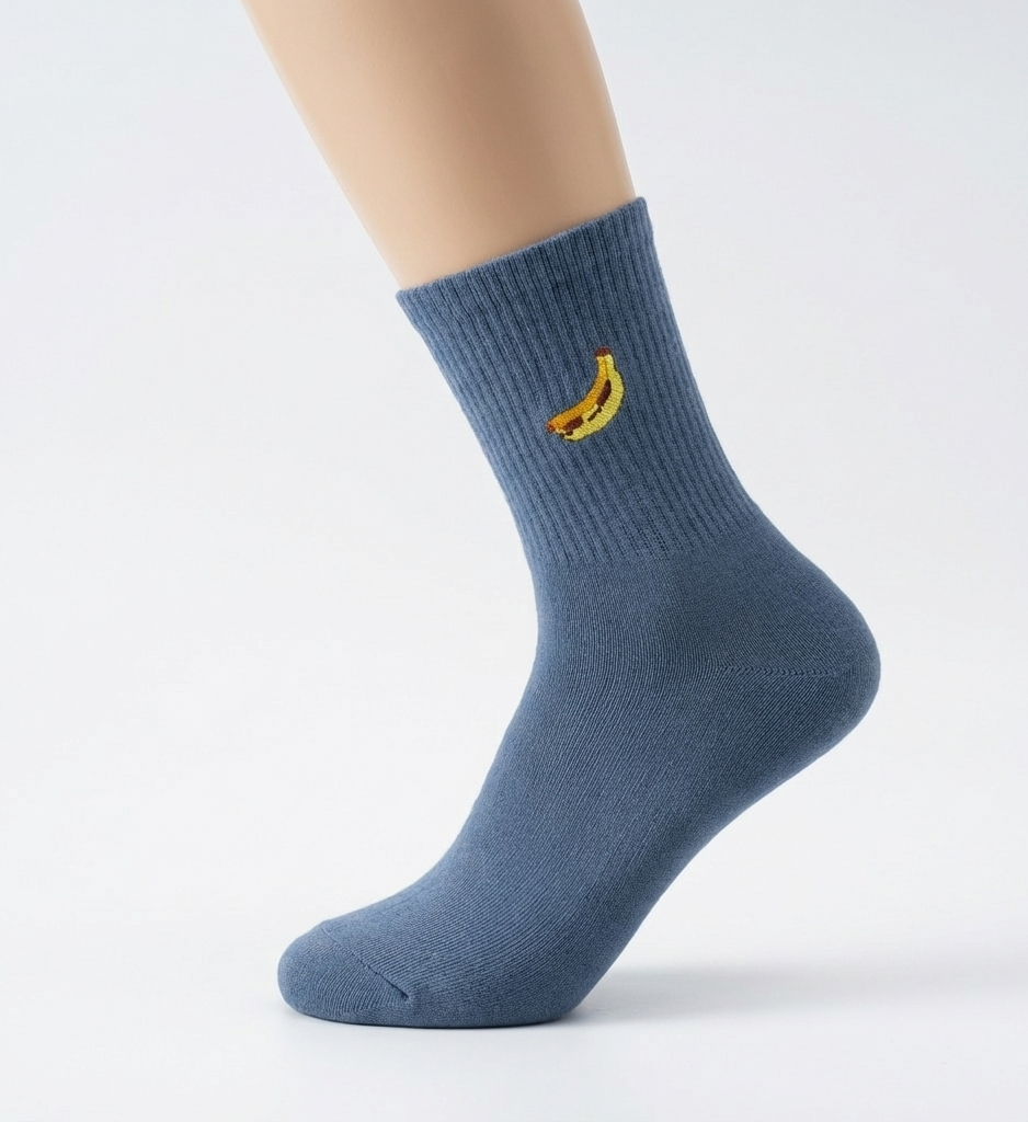 Blue sock with a banana design on a white background