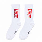 Liwa half crew socks by Socks Up, white with a red LIWA Moreeb Dune stamp, pair on white