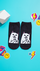 Black socks with white naughty cat design making rude gesture, pink ears.