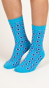 Blue crew socks with an all-over pattern of white and navy eye.