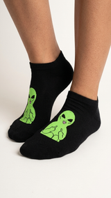 Black ankle socks with neon green alien characters making rude gestures, shown.