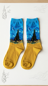 Pair of yellow and blue socks featuring Van Gogh's Starry Night design.