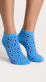 Blue ankle socks with repeating white and navy eye circle pattern.