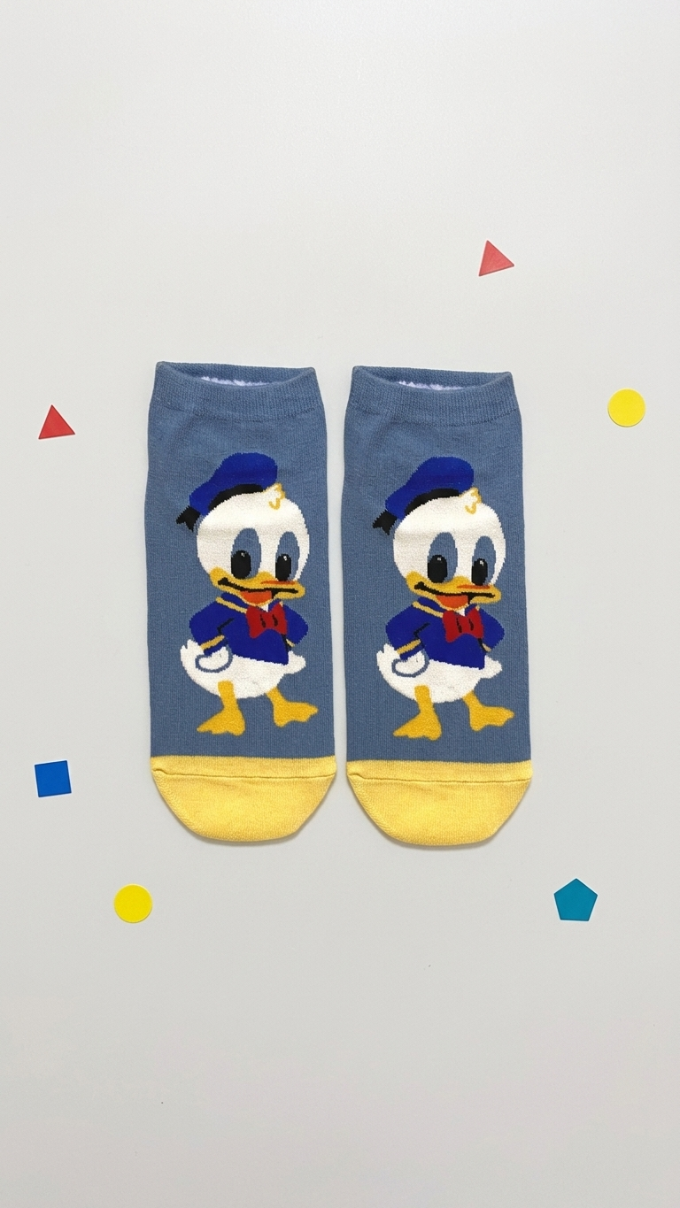 # Alt Text

Pair of blue and yellow Donald Duck socks featuring the character's face with sailor hat, red bow tie, and y