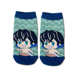 Demon Slayer Inosuke Chibi ankle socks by Socks Up, chibi Inosuke on a green zigzag pattern with navy toes, pair on white