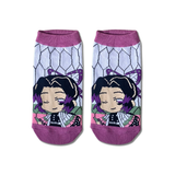 Demon Slayer Shinobu Chibi ankle socks by Socks Up, chibi Shinobu on a butterfly wing pattern with lilac toes, pair on white